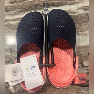 Crocs lite ride brand new with tags in bag. Navy/melon